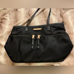 A Michael Kors black purse